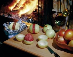 Onions shelled with hamburger inside to make onion meatloaf.