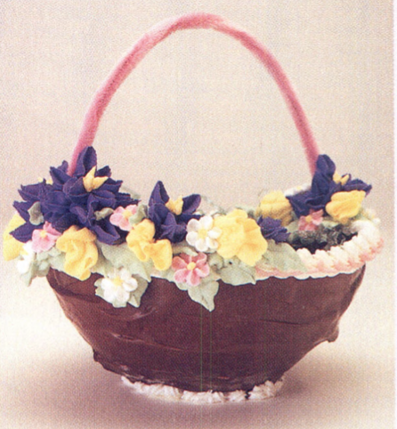 Learn how to decorate a chocolate Easter basket with royal icing flowers
