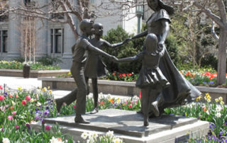 Dancing mom and kids stature at Temple Square in Salt Lake City Utah